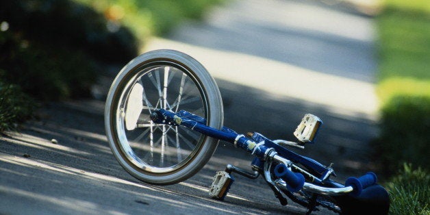 Child's bicycle left on path