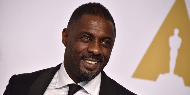 Idris Elba poses in the press room at the Oscars on Sunday, Feb. 22, 2015, at the Dolby Theatre in Los Angeles. (Photo by Jordan Strauss/Invision/AP)