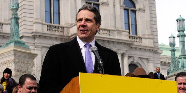 New York Gov. Andrew Cuomo speaks at a rally in support of charter schools on the steps of the state Capitol in Albany, N.Y., on Tuesday, March 4, 2014. Thousands of charter school supporters from around New York state took part in the rally. (AP Photo/Tim Roske)