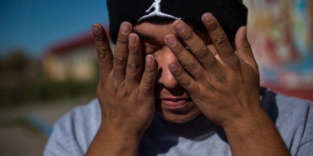 PINE RIDGE, SOUTH DAKOTA OCTOBER 25: Anthony Ghost-Redfeather, 18, is shown on Pine Ridge in South Dakota, on Saturday, O
