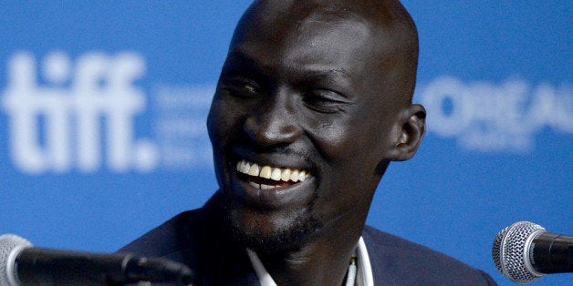 TORONTO, ON - SEPTEMBER 08: Actor Ger Duany speaks onstage at 'The Good Lie' Press Conference during the 2014 Toronto Intern