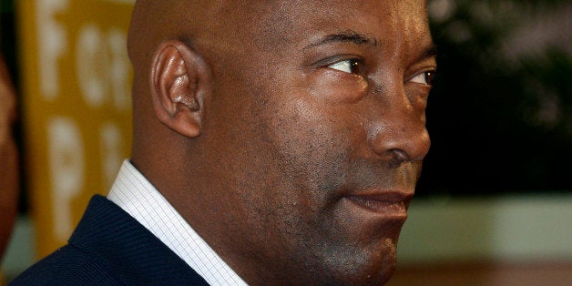 BEVERLY HILLS, CA - AUGUST 09: John Singleton arrives at the Hollywood Foreign Press Association's 2012 Installation Luncheon held at the Beverly Hills Hotel on August 9, 2012 in Beverly Hills, California. (Photo by Kevork Djansezian/Getty Images)