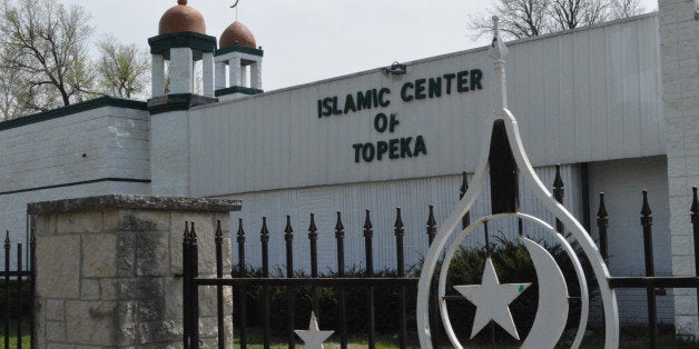 This Saturday, April 11, 2015 photo shows the Islamic Center of Topeka, Kan. Imam Omar Hazim says he was asked by the FBI to counsel a 20-year-old man who appeared to have mental problems and who is now charged with plotting a suicide bombing at Fort Riley, Kan. (AP Photo/Nicholas Clayton)