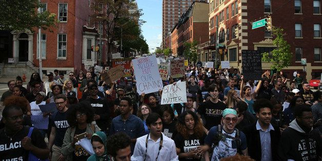 BALTIMORE, MD - APRIL 29: Students from Baltimore colleges and high schools march in protest chanting 'Justice for Freddie Gray' on their way to City Hall April 29, 2015 in Baltimore, Maryland. Baltimore remains on edge in the wake of the death of Freddie Gray, though the city has been largely peaceful following a day of rioting this past Monday. Gray, 25, was arrested for possessing a switch blade knife April 12 outside the Gilmor Houses housing project on Baltimore's west side. According to his attorney, Gray died a week later in the hospital from a severe spinal cord injury he received while in police custody. (Photo by Win McNamee/Getty Images)