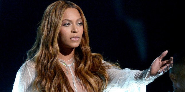 LOS ANGELES, CA - FEBRUARY 08: Singer Beyonce performs 'Precious Lord, Take My Hand' onstage during The 57th Annual GRAMMY Awards at the at the STAPLES Center on February 8, 2015 in Los Angeles, California. (Photo by Kevork Djansezian/Getty Images)