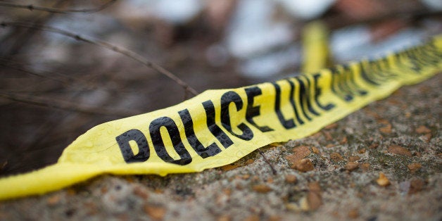 DELLWOOD, MO - MARCH 13: Crime scene tape remains in the rubble of a business that was destroyed during November rioting on March 13, 2015 in Dellwood, Missouri. The rioting broke out after residents learned that the police officer responsible for the killing of Michael Brown would not be charged with any crime. Few of the businesses destroyed in the rioting in Dellwood and nearby Ferguson have reopened. Two police officers were shot Wednesday while standing outside the Ferguson police station observing a protest. Ferguson has faced many violent protests since the August death of Michael Brown. (Photo by Scott Olson/Getty Images)