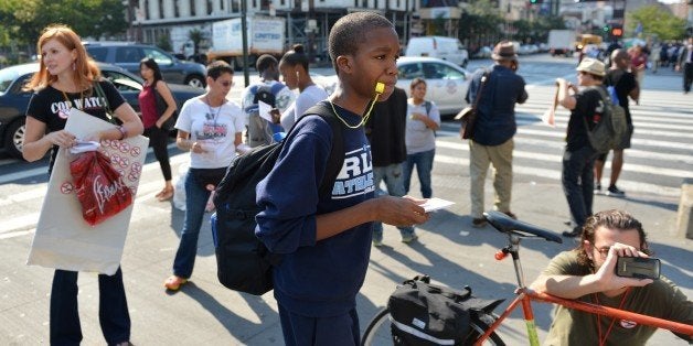 People blow whistles to protest the New York Police Department policy of 'stop-and-frisk' on September 13, 2012 in the Harlem
