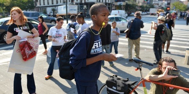 People blow whistles to protest the New York Police Department policy of 'stop-and-frisk' on September 13, 2012 in the Harlem section of New York. Groups gathered around New York City to âblow the whistleâ on a policy they say is unconstitutional, illegal and harrases mostly young black and Latino males. AFP PHOTO/Stan HONDA (Photo credit should read STAN HONDA/AFP/GettyImages)