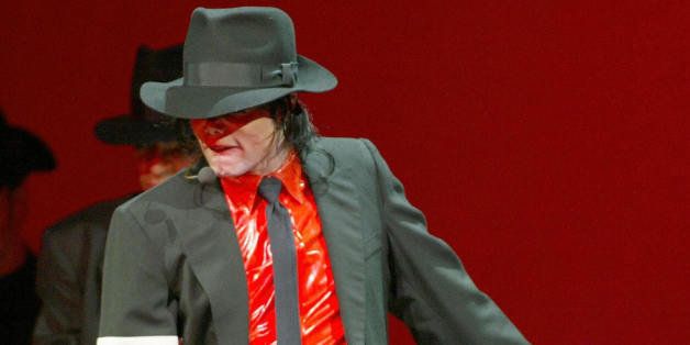 (FILES) US singer Michael Jackson performs during the Democratic National Committee (DNC) benefit concert, 'A Night at the Apollo', at the world-famous Apollo Theater 24 April 2002 in New York. Reports out of Los Angeles, California on June 25, 2009 say that Jackson ,50, has been rushed to the UCLA hospital after reportedly going into cardiac arrest and that he has died. AFP PHOTO/TIMOTHY A. CLARY/FILES (Photo credit should read TIMOTHY A. CLARY/AFP/Getty Images)