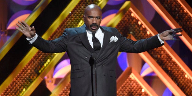 Steve Harvey presents the award for outstanding actress in a drama series at the 42nd annual Daytime Emmy Awards at Warner Bros. Studios on Sunday, April 26, 2015, in Burbank, Calif. (Photo by Chris Pizzello/Invision/AP)