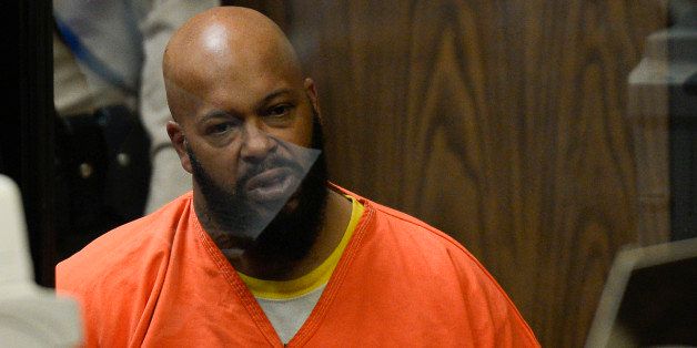 Death Row Records founder Marion "Suge" Knight appears in a courtroom during his arraignment at the Compton courthouse, Tuesday, Feb. 3, 2015, in Compton, Calif. Knight has pleaded not guilty to murder, attempted murder and other charges filed after he struck two men with his truck last week. (AP Photo/Paul Buck, Pool)