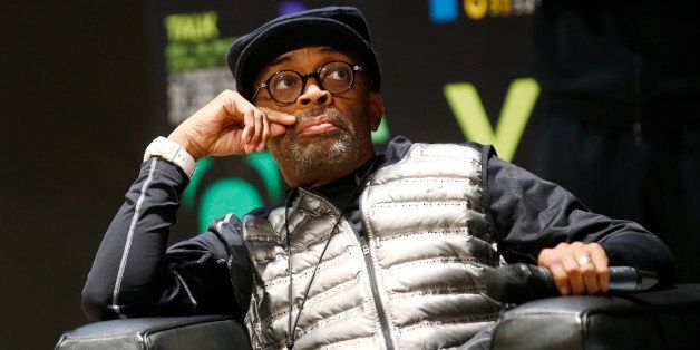 US movie director Spike Lee attends a meeting at the Bocconi University in Milan, Italy, Thursday, Dec. 11, 2014. (AP Photo/Luca Bruno)