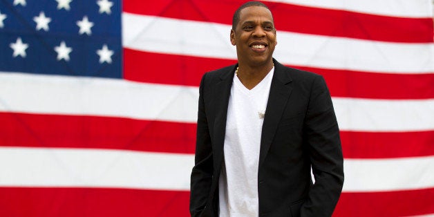FILE - In this May 14, 2012 file photo, entertainer Shawn "Jay-Z" Carter smiles in between interviews, after a news conferenc