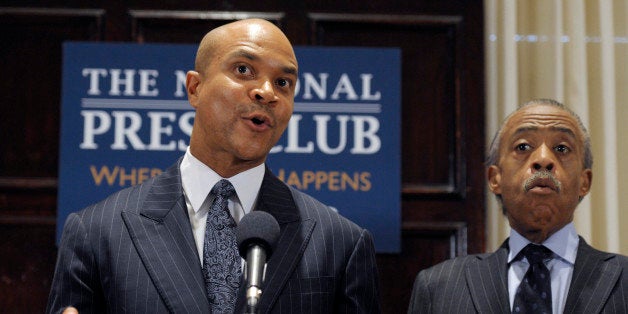 Rev. Delman Coates, senior pastor of Mt. Enon Baptist Church, Clinton, Md.,speaks during an announcement of support for the civil marriage of gay and lesbian couples during a news conference at the National Press Club in Washington, Friday, Sept. 21, 2012, as Rev. Al Sharpton, president, National Action Network, right, looks on. The ministers urged Maryland residents to vote for Question 6 on the November ballot. (AP Photo/Cliff Owen)