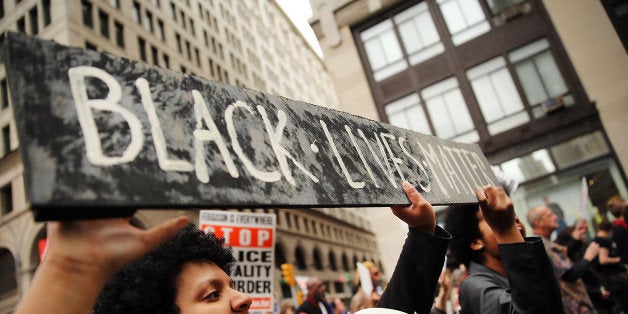 NEW YORK, NY - APRIL 14: Protesters against police violence march in Manhattan on April 14, 2015 in New York City. A coalation of anti police violence and anti racist organizations gathered in Union Square to listen to speakers before setting off on a march down lower Broadway. Following the dath of Eric Garner during a confrontation with NYPD officers last summer, New York has become one of the nations focal points for protests against the police. Along with Garner's death, the cases of Ferguson teen Michael Brown and Walter Scott in South Carolina have energized the movement against the police. The marchers hope to highlight the individual cases and to pressure law makers and police departments across the country to institute changes in how the police confront to citizens. (Photo by Spencer Platt/Getty Images)