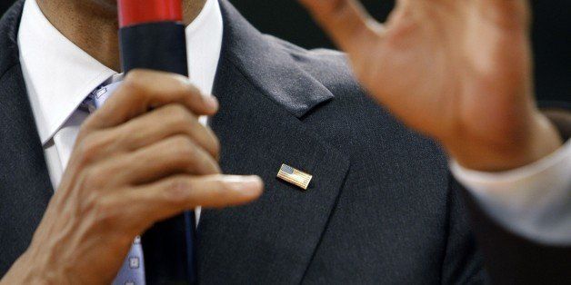 FILE - In this June 5, 2008 file photo, then-Democratic presidential hopeful Sen. Barack Obama D-Ill., wears an American flag pin as he speaks at a town hall-style meeting at Virginia High School in Bristol, Va. The president's re-election campaign is increasingly sounding like a nostalgia tour. His speeches stroll through elections past, serving up fond memories of his days running as a political unknown, identifying early political inspirations and reminding voters that, win or lose, this will be his last campaign after 13 appearances on the ballot since 1996. (AP Photo/Alex Brandon, File)