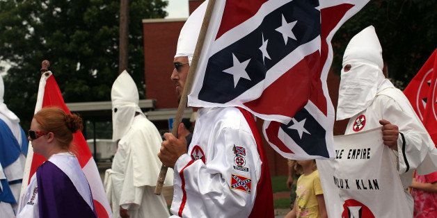 PULASKI, TN - JULY 11: Members of the Fraternal White Knights of the Ku Klux Klan participate in the 11th Annual Nathan Bedford Forrest Birthday march July 11, 2009 in Pulaski, Tennessee. With a poor economy and the first African-American president in office, there has been a rise in extremist activity in many parts of America. According to the Southern Poverty Law Center in 2008 the number of hate groups rose to 926, up 4 percent from 2007, and 54 percent since 2000. Nathan Bedford Forrest was a lieutenant general in the Confederate Army during the American Civil War and played a role in the postwar establishment of the first Ku Klux Klan organization opposing the reconstruction era in the South. (Photo by Spencer Platt/Getty Images)