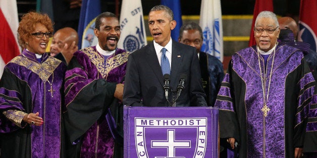 CHARLESTON, SC - JUNE 26: President Barack Obama sings 'Amazing Grace' as he delivers the eulogy for South Carolina state senator and Rev. Clementa Pinckney during Pinckney's funeral service June 26, 2015 in Charleston, South Carolina. Suspected shooter Dylann Roof, 21, is accused of killing nine people on June 17th during a prayer meeting in the church, which is one of the nation's oldest black churches in Charleston. (Photo by Joe Raedle/Getty Images)