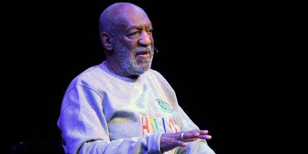 Comedian Bill Cosby performs during a show at the Maxwell C. King Center for the Performing Arts in Melbourne, Fla., Friday,
