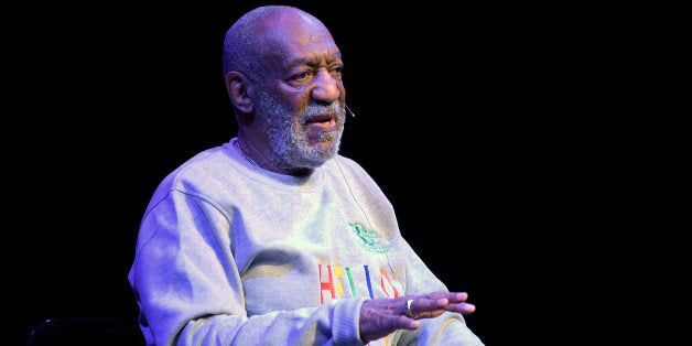 Comedian Bill Cosby performs during a show at the Maxwell C. King Center for the Performing Arts in Melbourne, Fla., Friday, Nov. 21, 2014.(AP Photo/Phelan M. Ebenhack)