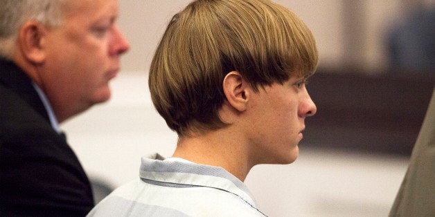 CHARLESTON, SC - JULY 16: Dylann Roof (R), 21, listens to proceeding with assistant defense attorney William Maguire during a hearing at the Judicial Center July 16, 2015 in Charleston, South Carolina. Roof is charged with murdering nine worshippers at a historic black church in Charleston last month. (Photo by Randall Hill - Pool/Getty Images)