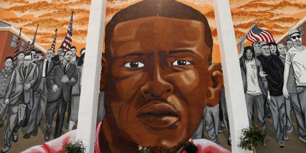 BALTIMORE, MD - JUNE 09: A mural memorializing Baltimore resident Freddie 'Pepper' Gray is painted on the wall near the place where he was tackled and arrested by police at the Gilmor Homes housing project June 9, 2015 in Baltimore, Maryland. In the wake of protests, demonstrations and riots triggered by the April 19 death of Gray, officials said the city experienced 43 murders last month, its deadliest May since 1970. People who live in Gray's neighborhood say one of the reasons for the spike in shootings is because police have dramatically increased response time, creating an atmosphere of lawlessness in some of Baltimore's most crime-affected areas. (Photo by Chip Somodevilla/Getty Images)