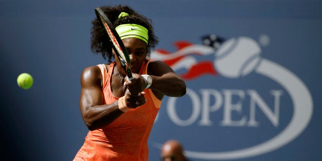 Serena Williams returns a shot to Roberta Vinci, of Italy, during a semifinal match at the U.S. Open tennis tournament, Friday, Sept. 11, 2015, in New York. (AP Photo/David Goldman)