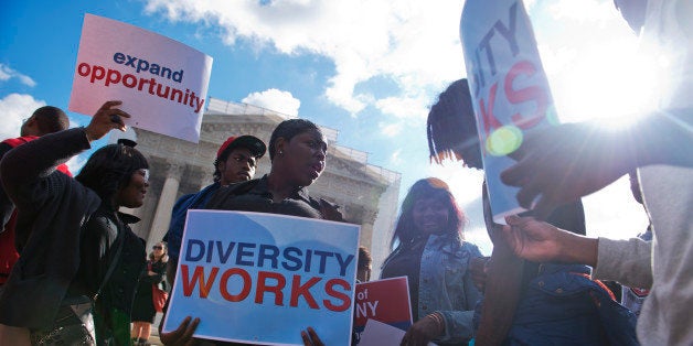 UNITED STATES - OCTOBER 10: Kenya Battle, 17, a junior at Dunbar High School in Northwest, stands outside of the Supreme Court as the justices heard oral arguments in Fisher v. University of Texas case, which could limit affirmative action practices that colleges and universities use in admissions departments. (Photo By Tom Williams/CQ Roll Call)