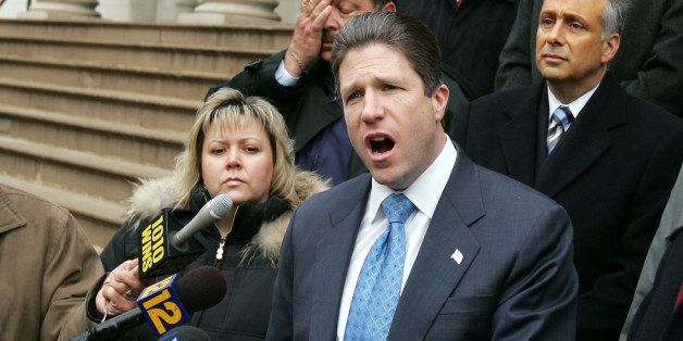 UNITED STATES - DECEMBER 10: Patrolmen Benevolent Association President Pat Lynch speaks, flanked by State Sen. Martin Golden (right) and Janet Ryman, during a news conference on the steps of City Hall protesting the possible parole of imprisoned cop killer Shuaib Raheem. Raheem has been behind bars for the past 35 years for the murder of Police Officer Stephen Gilroy during a botched robbery in 1973. Ryman is the daughter of late Police Officer Harry Ryman who was fatally shot in 1980. (Photo by Corey Sipkin/NY Daily News Archive via Getty Images)