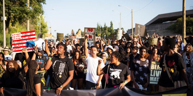 TORONTO, ON- JULY 27 - Uranranebi Agbeyegbe screams into a microphone during a Black Lives Matter protest that marched from G