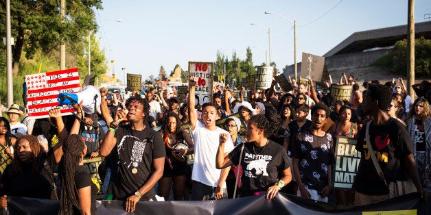 TORONTO, ON- JULY 27 - Uranranebi Agbeyegbe screams into a microphone during a Black Lives Matter protest that marched from Gilbert Avenue to Allen Road on Eglinton Avenue. The protest shut down the southbound Allen Road for around 30 minutes, causing traffic to reverse and exit through Lawrence Avenue. (Melissa Renwick/Toronto Star via Getty Images)