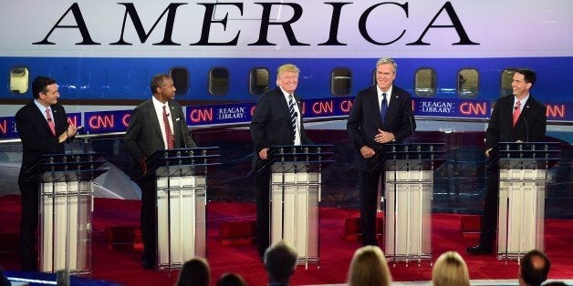 Republican presidential hopefuls Ted Cruz, Ben Carson, Donald Trump, Jeb Bush, and Scott Walker participate in the Republican Presidential Debate at the Ronald Reagan Presidential Library in Simi Valley, California on September 16, 2015. Republican presidential frontrunner Donald Trump stepped into a campaign hornet's nest as his rivals collectively turned their sights on the billionaire in the party's second debate of the 2016 presidential race. AFP PHOTO / FREDERIC J. BROWN (Photo credit should read FREDERIC J BROWN/AFP/Getty Images)