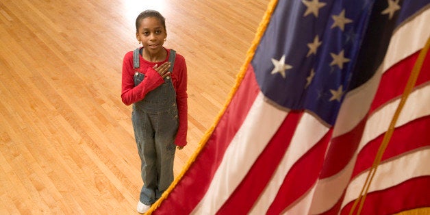 Girl reciting the pledge of allegiance