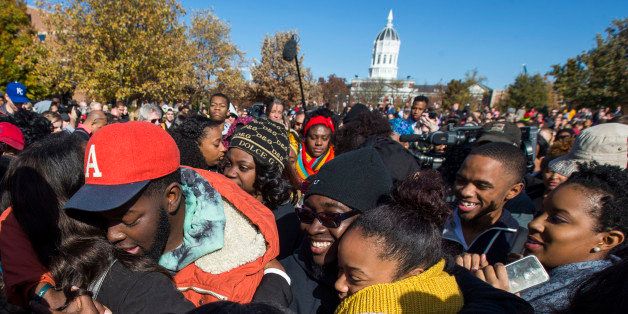 COLUMBIA, MO - NOVEMBER 9: Protesters celebrate after the resignation resignation of Missouri University president Timothy M. Wolfe on the Missouri University Campus November 9, 2015 in Columbia, Missouri. Wolfe resigned after pressure from students and student athletes over his perceived insensitivity to racism on the university campus. (Photo by Brian Davidson/Getty Images)