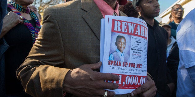 The Saint Sabina church and other area churches offer a reward at the site where Tyshawn Lee, 9, was fatally shot in Chicago's Gresham neighborhood on Monday. (Zbigniew Bzdak/Chicago Tribune/TNS via Getty Images)