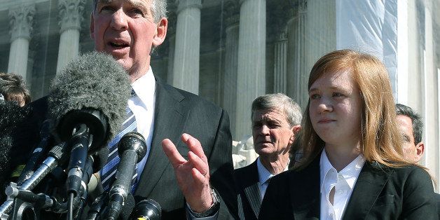 WASHINGTON, DC - OCTOBER 10: Attorney Bert Rein (L), speaks to the media while standing with plaintiff Abigail Noel Fisher (R), after the U.S. Supreme Court heard arguments in her caseon October 10, 2012 in Washington, DC. The high court heard oral arguments on Fisher V. University of Texas at Austin and are tasked with ruling on whether the university's consideration of race in admissions is constitutional. (Photo by Mark Wilson/Getty Images)