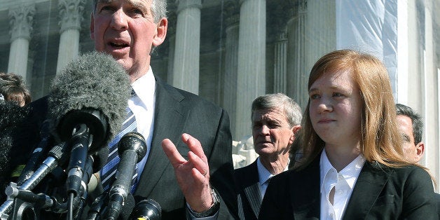 WASHINGTON, DC - OCTOBER 10: Attorney Bert Rein (L), speaks to the media while standing with plaintiff Abigail Noel Fisher (