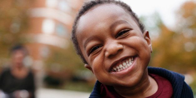 Close up of smiling face of African American boy