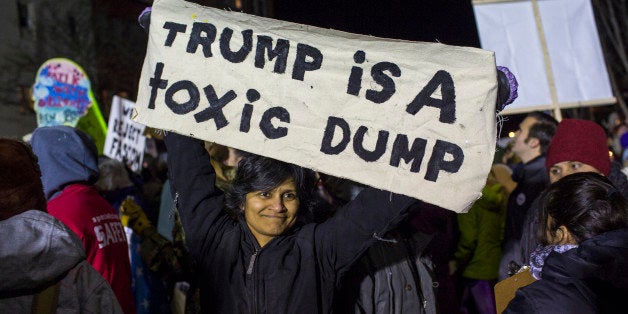 BURLINGTON, VT - JANUARY 07: Protesters rally outside of Republican presidential frontrunner Donald Trump's event at the Flynn Center for the Performing Arts on January 7, 2016 in Burlington, Vermont. The line to enter the event wrapped around the venue and down multiple streets and multiple groups of protesters were. (Photo by Robert Nickelsberg/Getty Images)