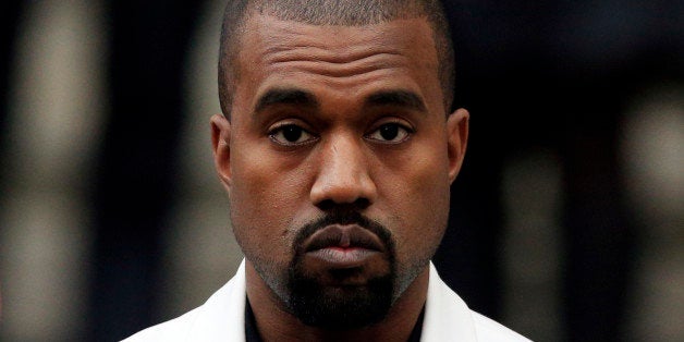 Kanye West leaves St. Paul's Cathedral following the memorial service of Professor Louise Wilson.