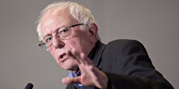 Senator Bernie Sanders, an independent from Vermont and 2016 Democratic presidential candidate, speaks during a rally in Sioux City, Iowa, U.S., on Monday, Dec. 21, 2015. After months of branding himself as the anti-Wall Street candidate, Democratic presidential hopeful Sanders seems to be broadening his focus by spending far more time discussing foreign policy during the weekend debate in New Hampshire than he has in the past. Photographer: Daniel Acker/Bloomberg via Getty Images 