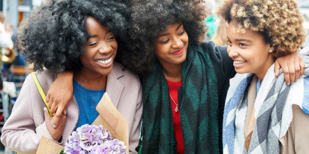 Friends shopping at a flower market.