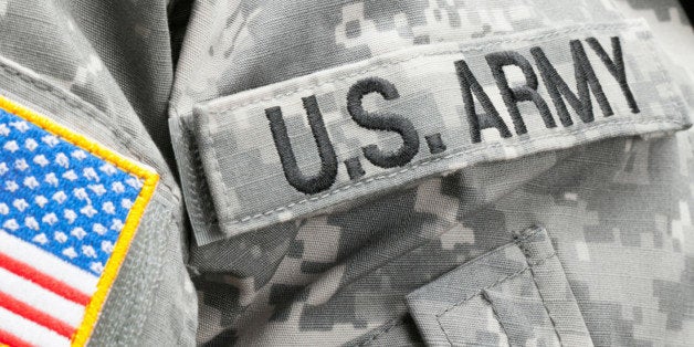 USA flag and U.S. Army patch on solder's uniform