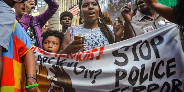 TIMES SQUARE, NEW YORK, UNITED STATES - 2015/08/13: After rallying near the NYPD station in Times Square at the conclusion of