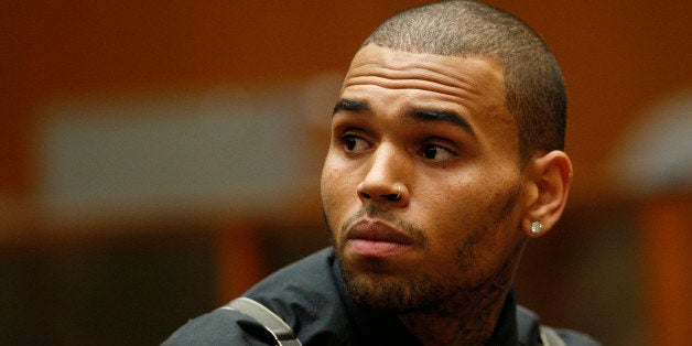 LOS ANGELES, CA - NOVEMBER 1: R&B singer Chris Brown appears in court for a probation progress report hearing on November 1, 2012 in Los Angeles, California. Brown pleaded guilty to assaulting his then-girlfriend, singer Rihanna, after a pre-Grammy Awards party in 2009. (Photo by David McNew/Getty Images)