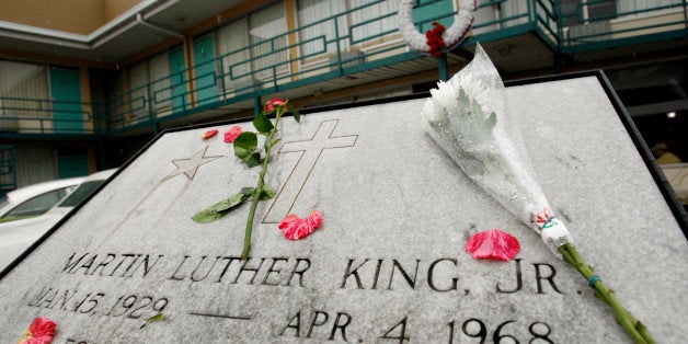 Flowers lie on the plaque that lays at Lorraine Motel, now part of the National Civil Rights Museum, where Rev. Dr. Martin Lu