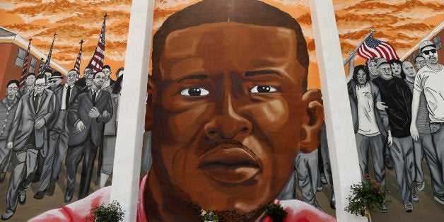 BALTIMORE, MD - JUNE 09: A mural memorializing Baltimore resident Freddie 'Pepper' Gray is painted on the wall near the plac
