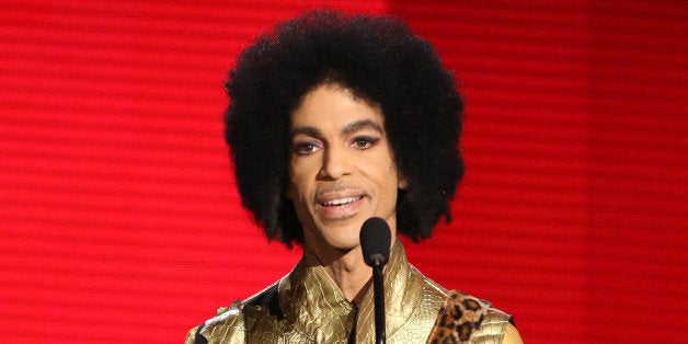 FILE - In this Nov. 22, 2015 file photo, Prince presents the award for favorite album - soul/R&B at the American Music Awards