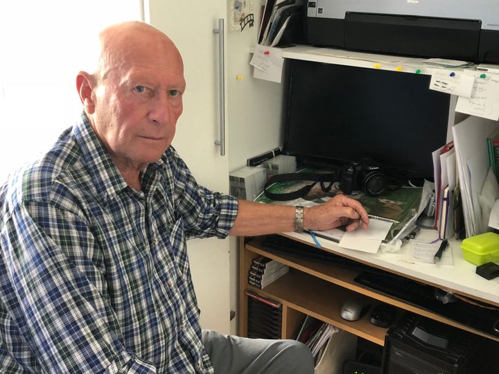 Peter Smith at his home computer which the fraudster carried out the scam through