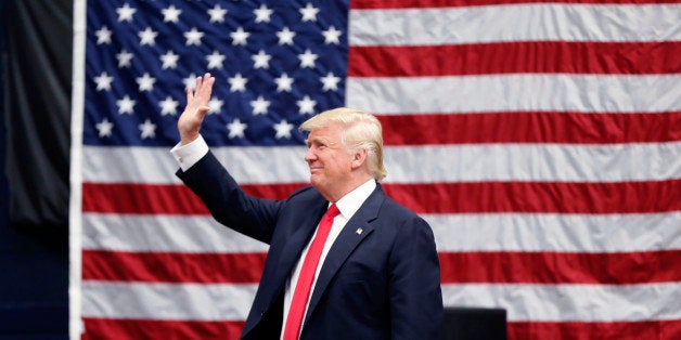Republican presidential candidate Donald Trump arrives to speak at a campaign rally in Akron, Ohio, Monday, Aug. 22, 2016. (A